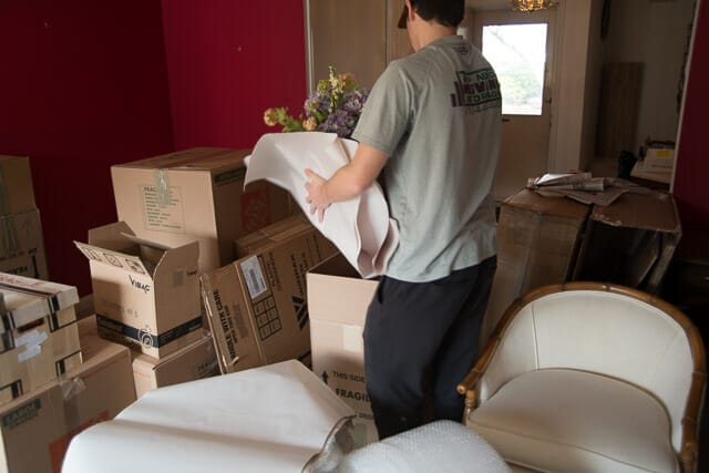 Moving fragile items through a packed room